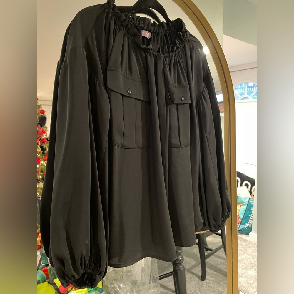 La La Von Black Blouse. Size: Medium. Long sleeve. Off shoulder optional.